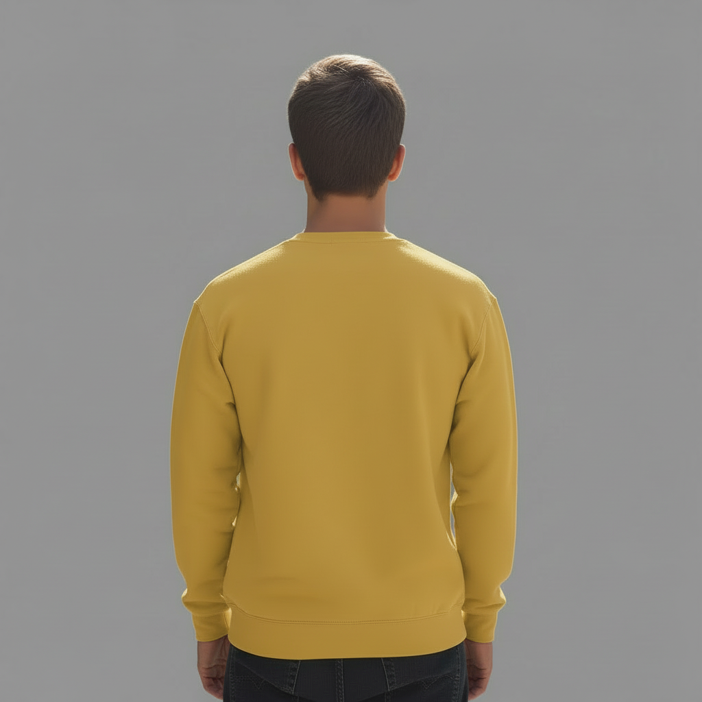 Backview of Man wearing a yellow ‘Crossed By Many, Saved By One’ crewneck sweatshirt with a navy and gold cross emblem, standing against a neutral gray background.”