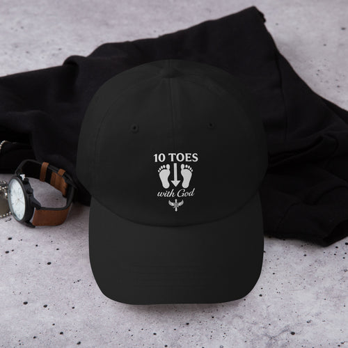 "Black baseball cap with white 10 Toes Down emblem featuring two feet and the words '10 Toes Down' beneath."