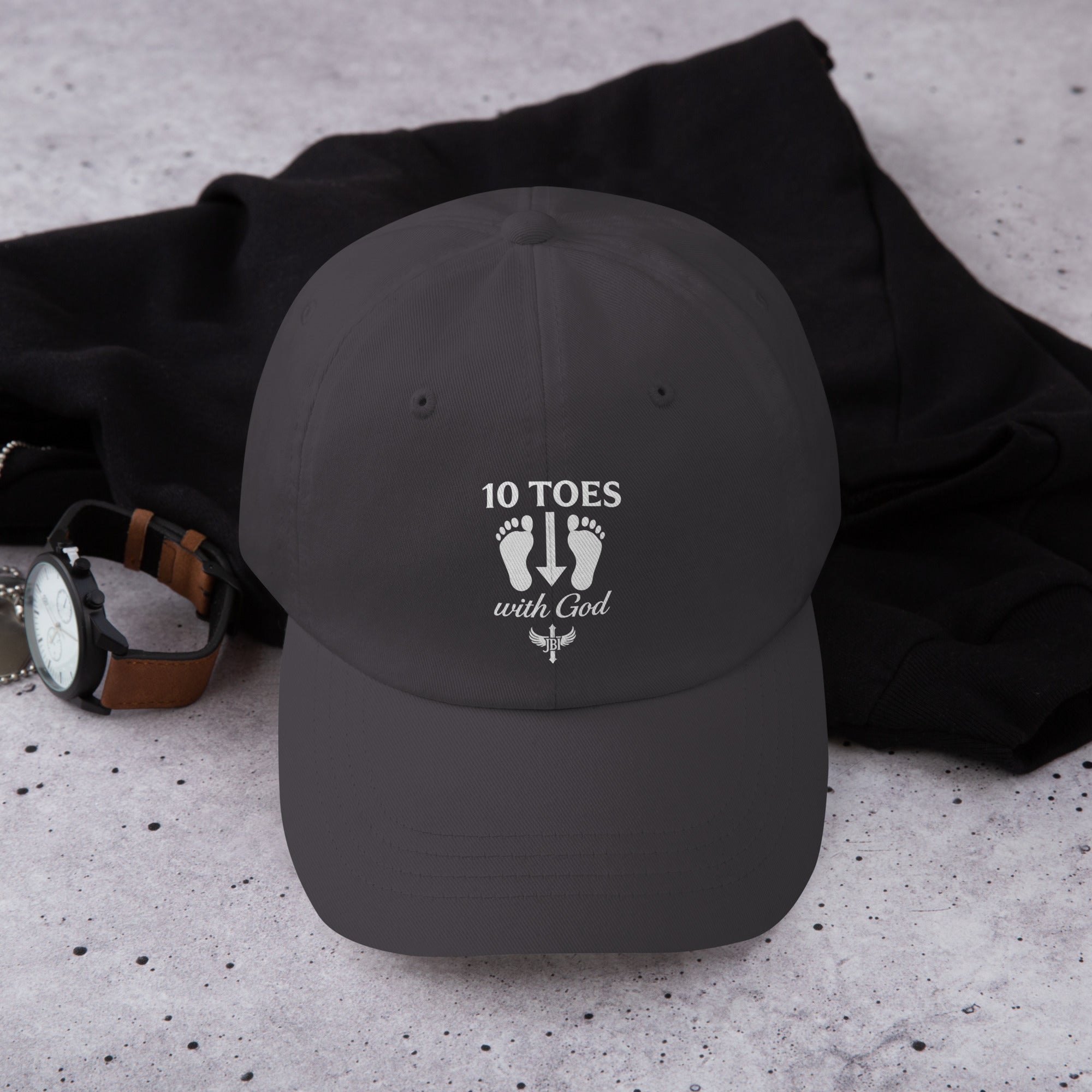 "Dark gray baseball cap with white 10 Toes Down emblem featuring two feet and the words '10 Toes Down' beneath."