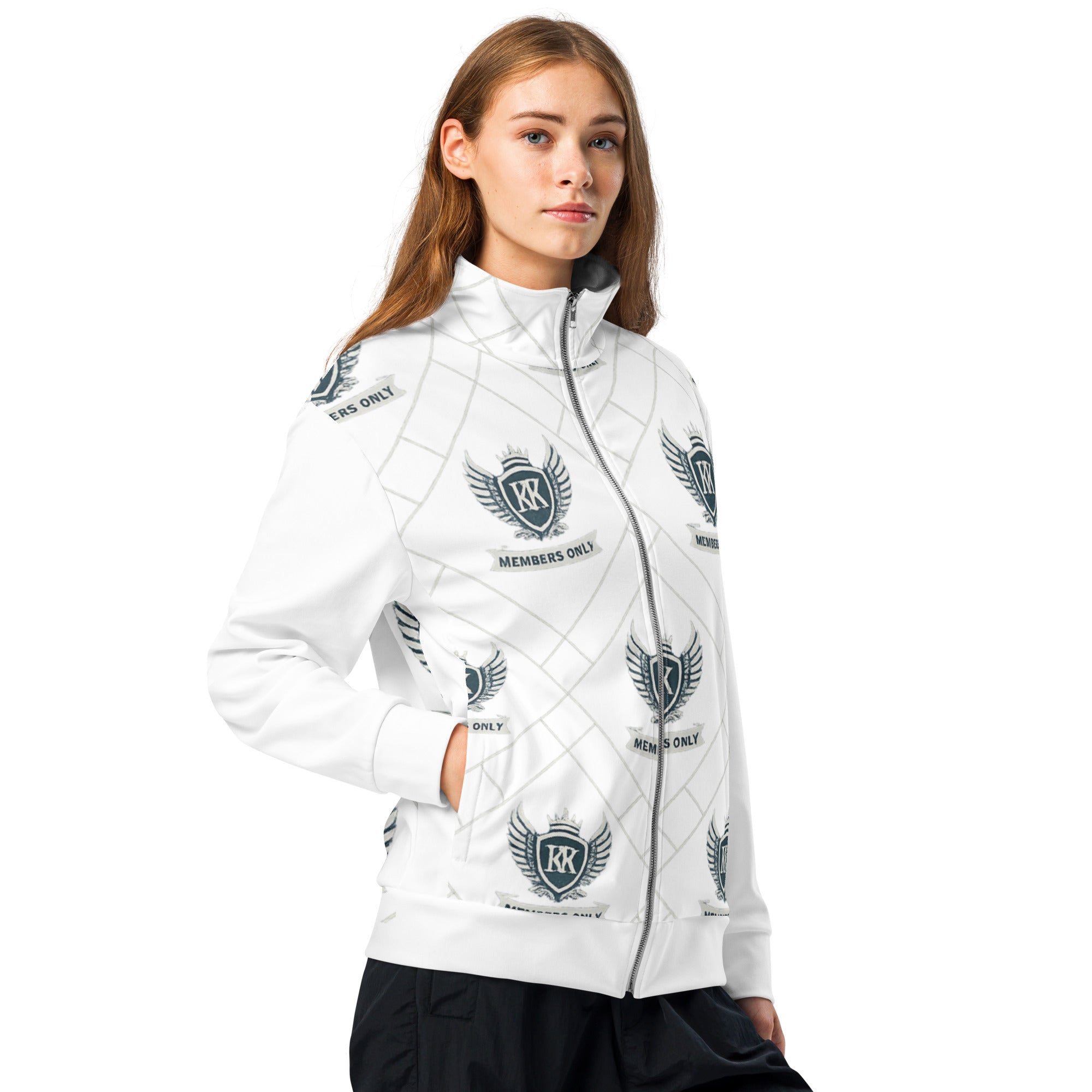 Front View (shown): White zip-up jacket with all-over printed Kingdom Krew “Members Only” crest logo featuring wings and crown, styled on a female model.