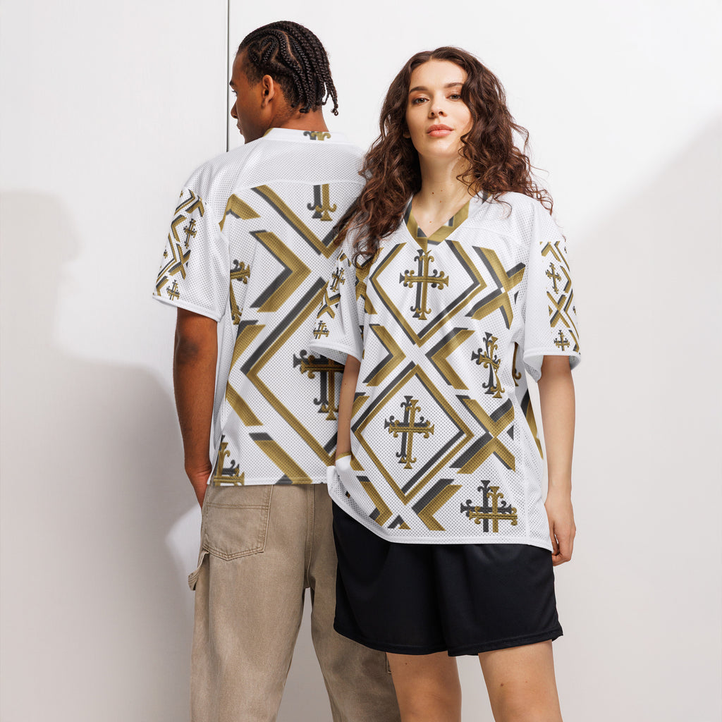 “Front view of Kingdom Luxe Cross Jersey in white mesh with bold gold and black cross pattern, luxury Christian streetwear top.”, luxury Christian streetwear top.”