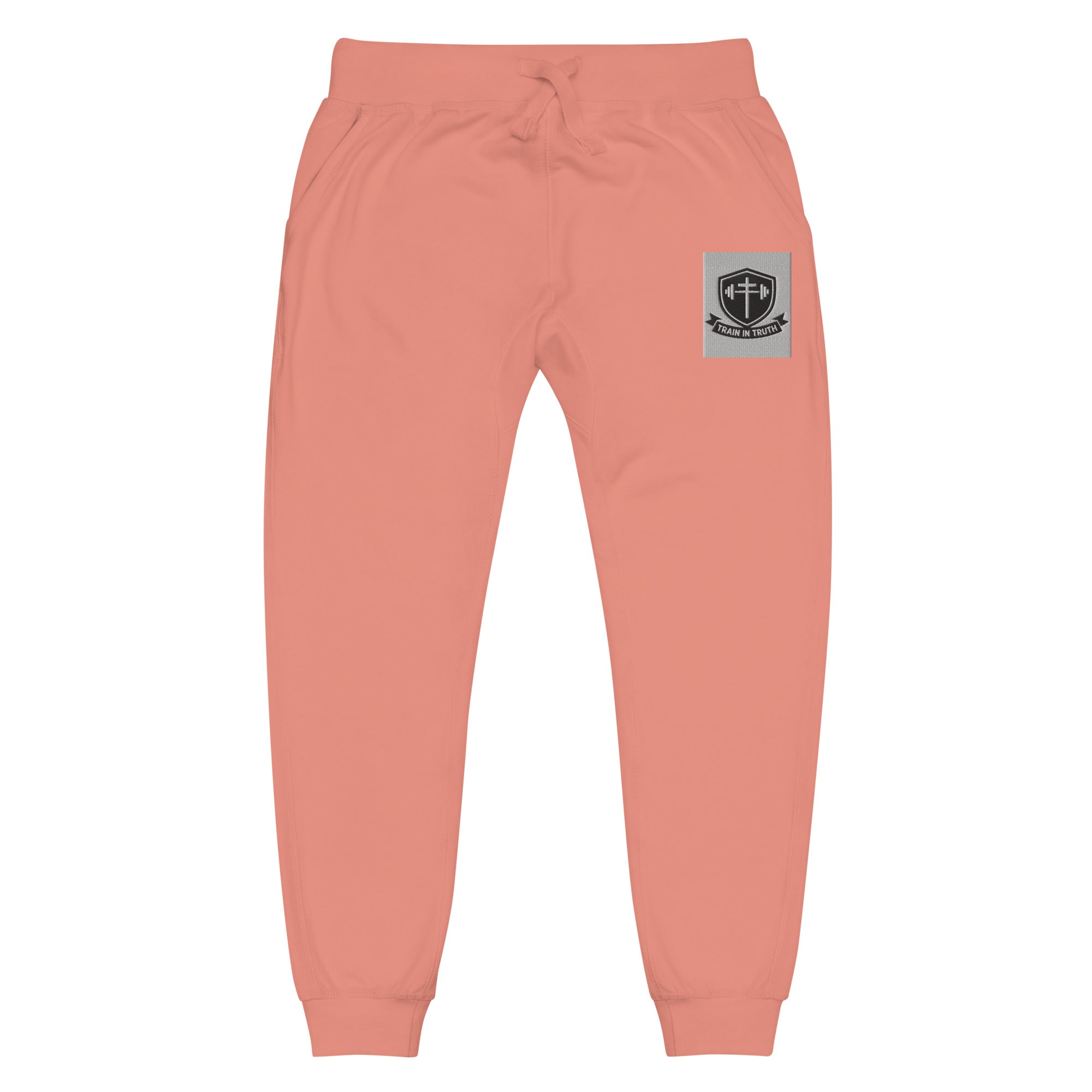 Front view of dusty  rose Train in Truth Fleece Sweatpants with embroidered emblem on thigh