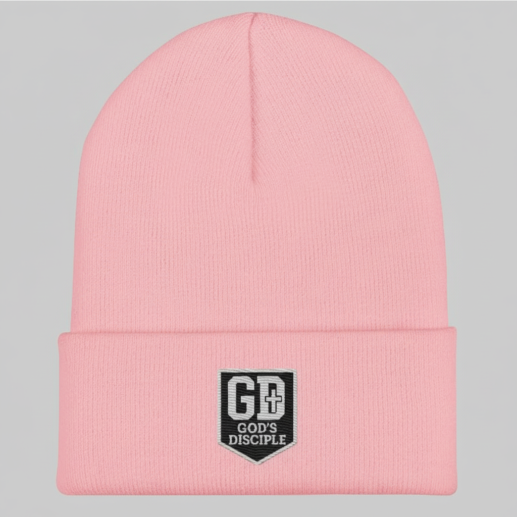 “God’s Disciple knit beanie in soft pink featuring the GD shield logo.”