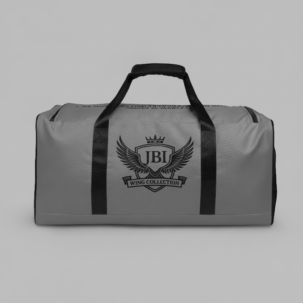 “JBI All-Over Print Duffle Bag with wings crest logo, black handles, and premium travel design in gray.”