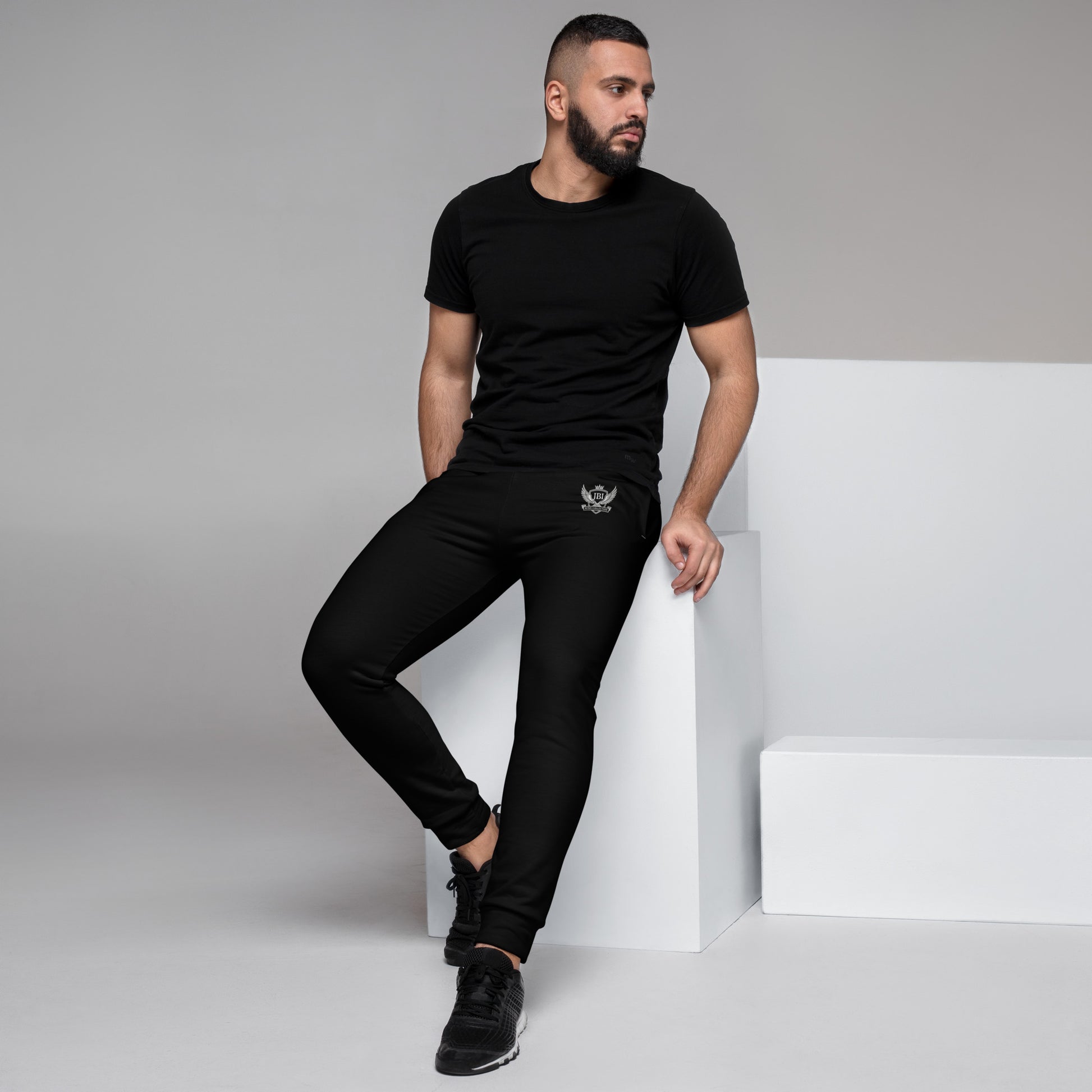 JBI Wing unisex joggers black worn by model
