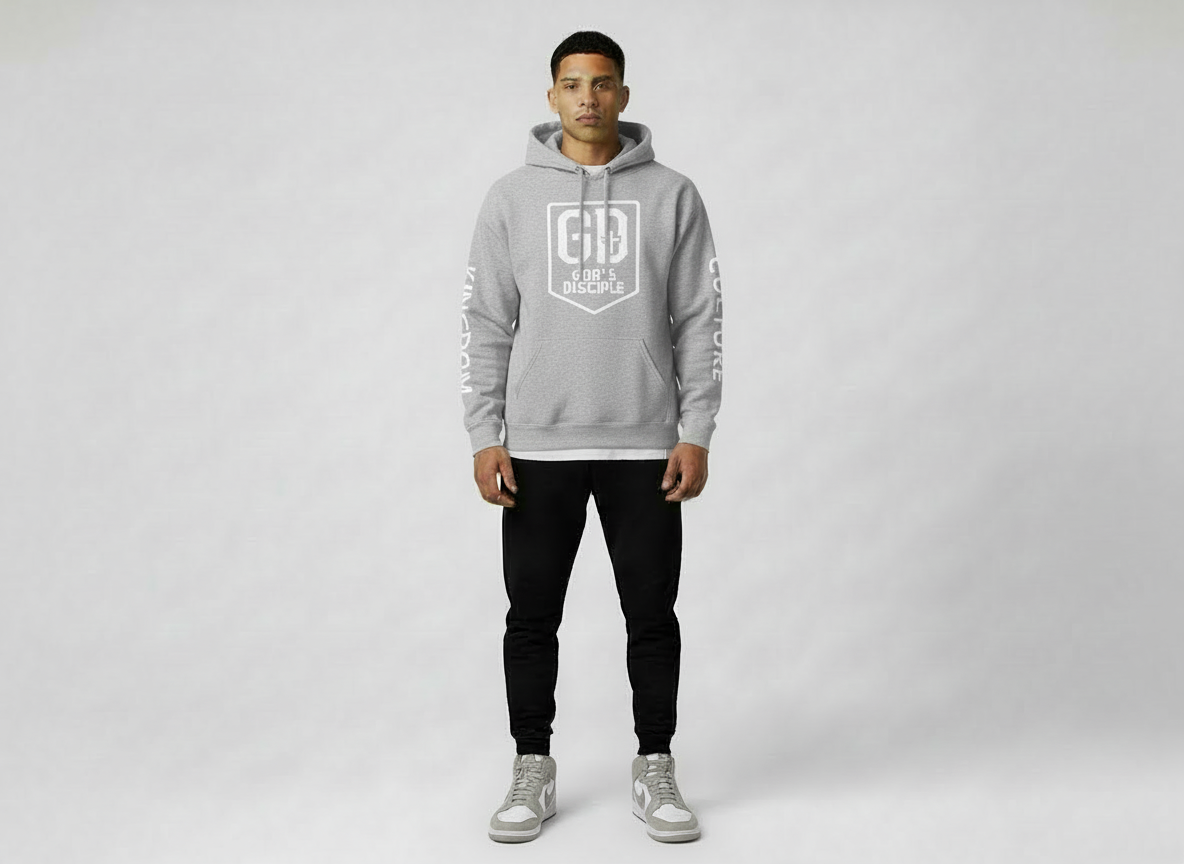 “Man wearing grey God’s Disciple hoodie in a clean studio setting.”