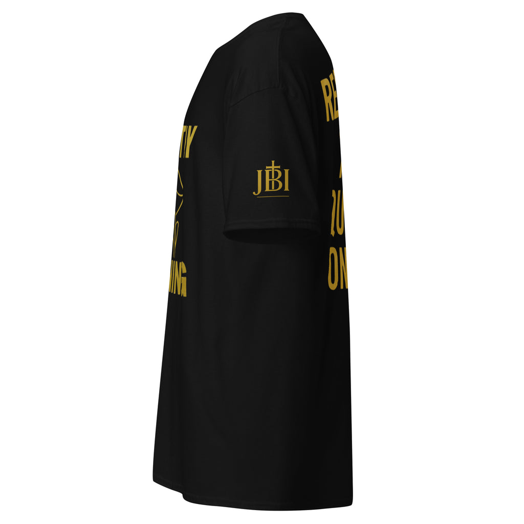 JBI side view of Black Silently Winning t-shirt with gold lettering visible on chest. 