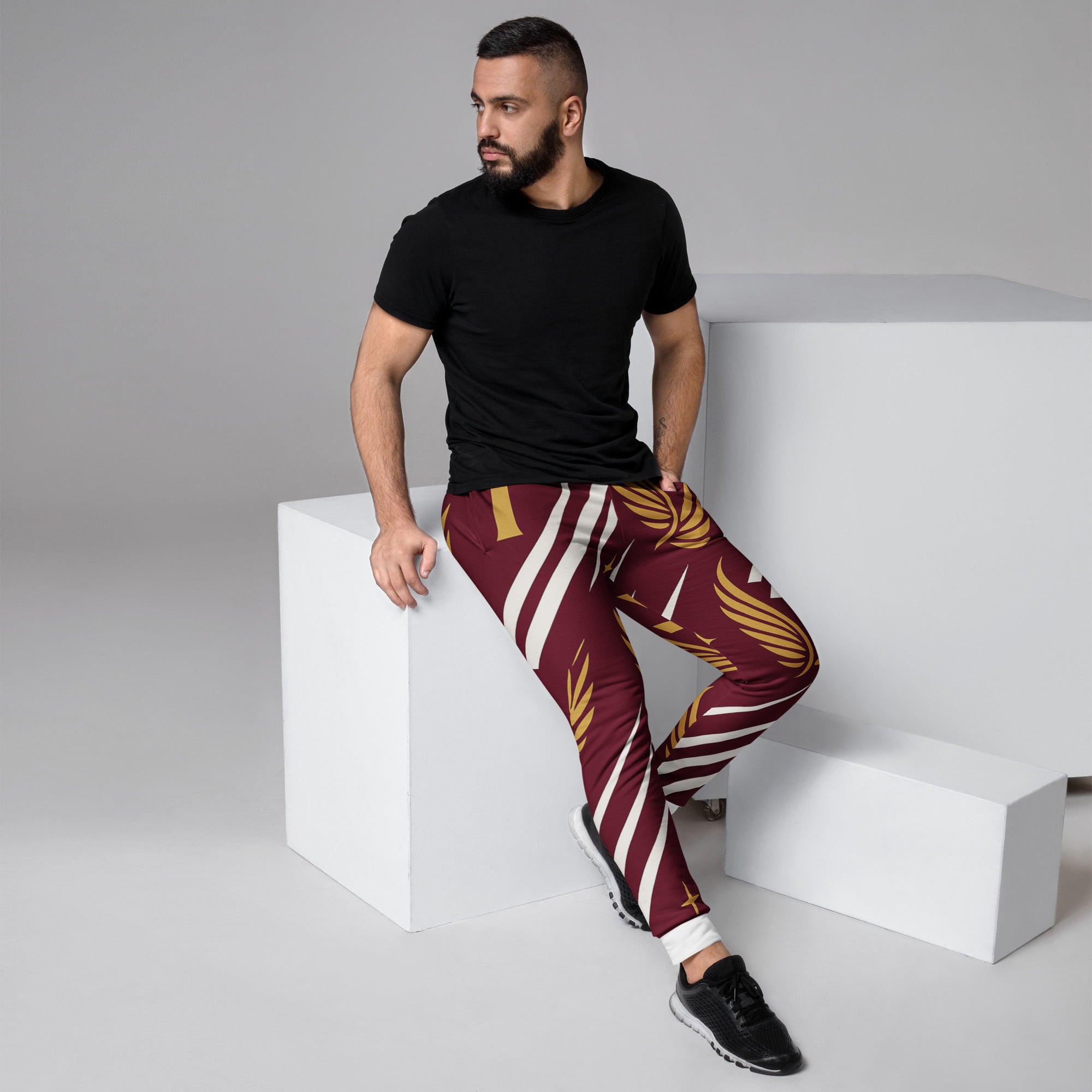 Model wearing Royal Luxe Joggers in maroon, luxury unisex streetwear with faith-inspired design and premium comfort fit.