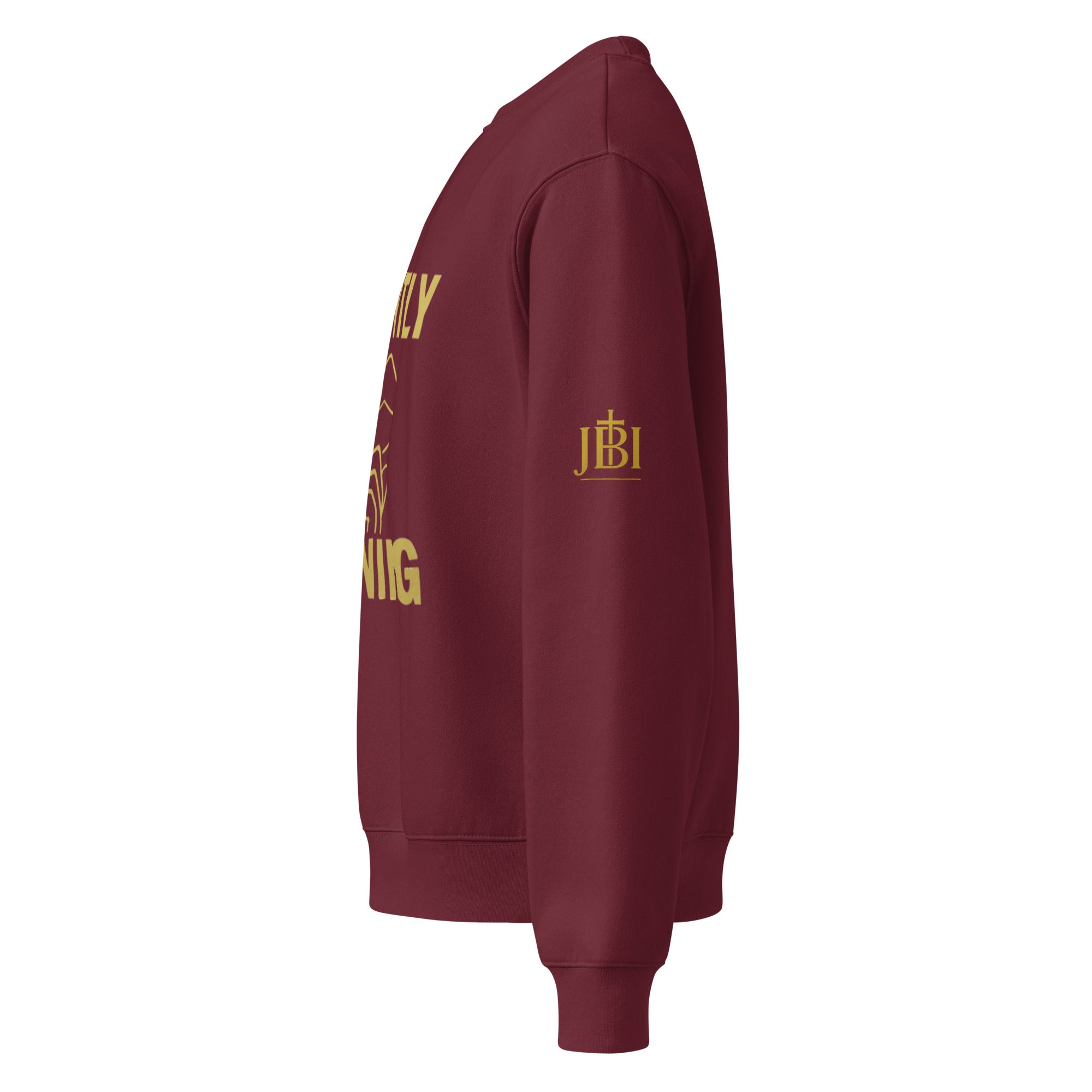 Side view of Black Silently Winning crewneck sweatshirt with gold lettering on front. Premium Christian apparel in unisex fit with luxury styling. Premium Christian apparel in unisex fit with luxury styling.