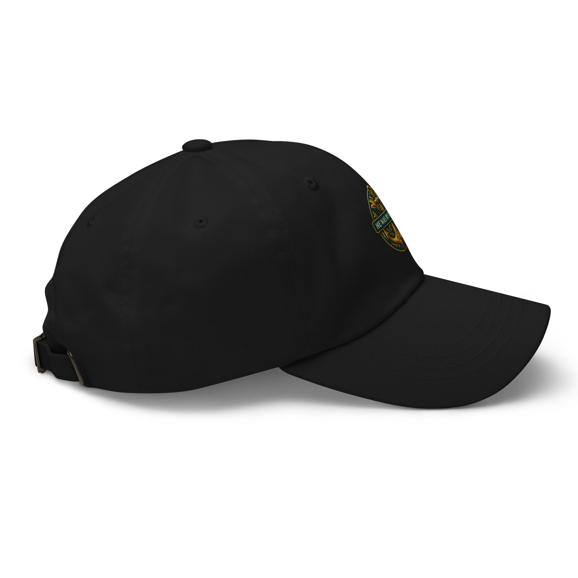 "Side view of black baseball cap showing the He Was My Anchor emblem and curved brim."