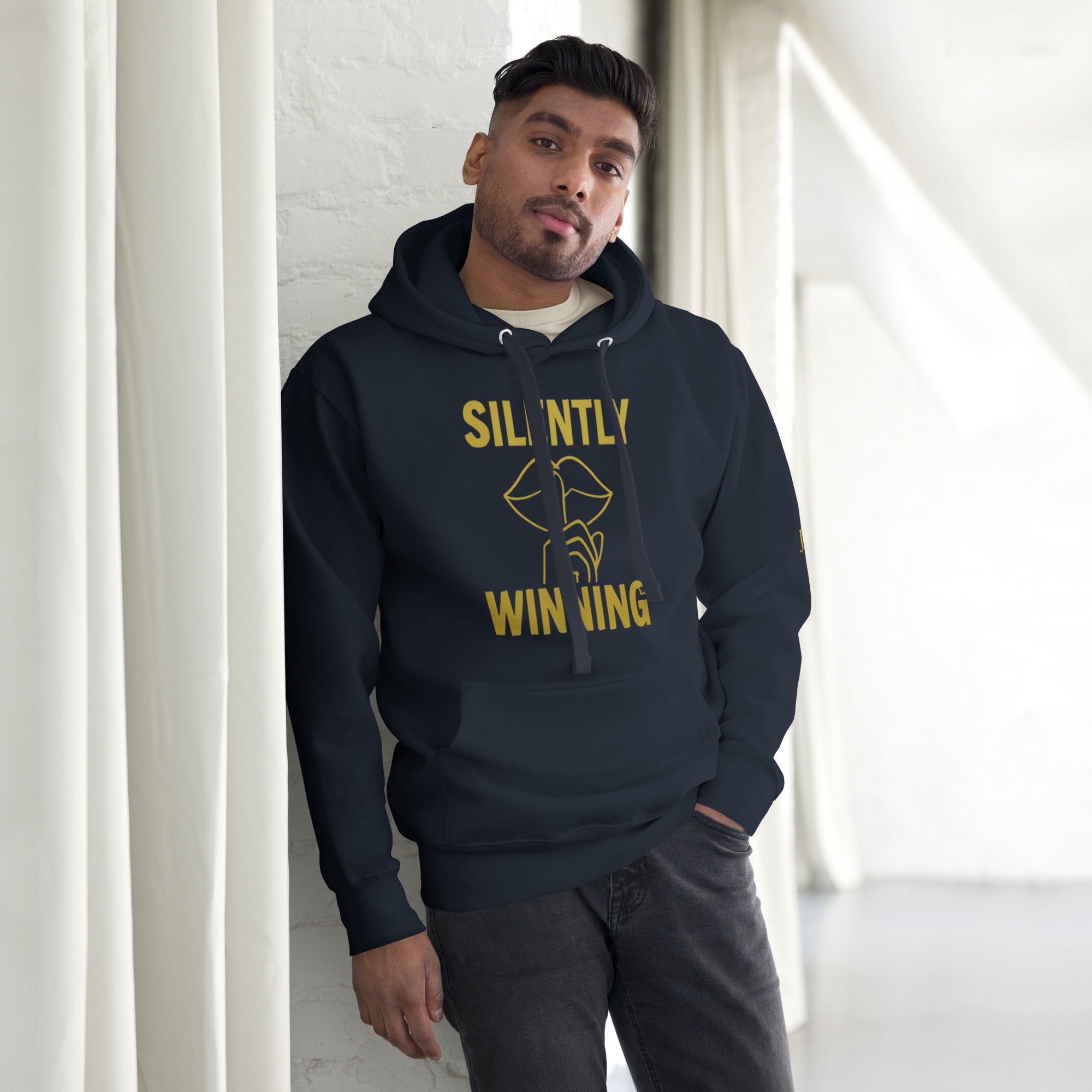 Silently Winning Hoodie in navy blue, premium unisex streetwear blending comfort, style, and inspirational message.
