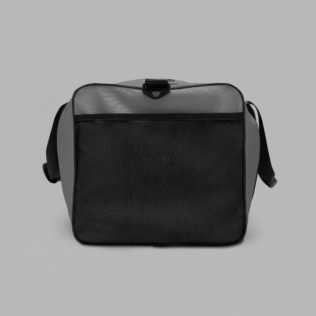 “Back view of the JBI All-Over Print Duffle Bag with solid black panel and durable construction.”