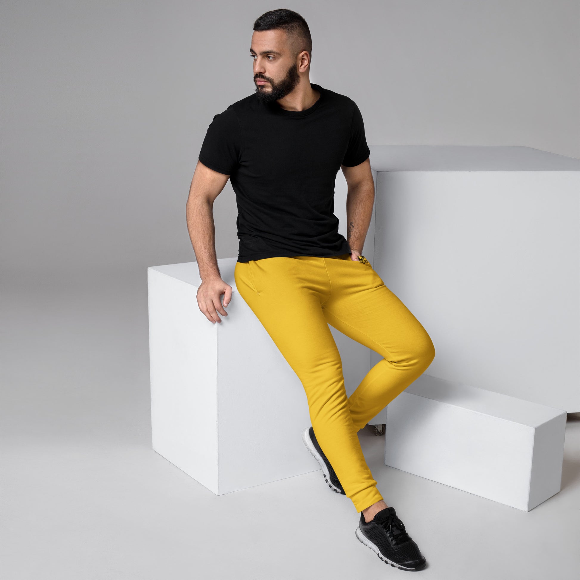 JBI Wing unisex joggers yellow worn by model
