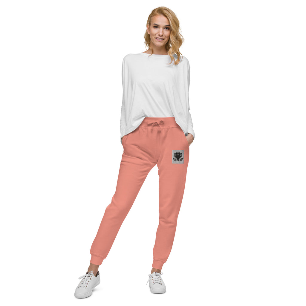 Front view of dusty rose Train in Truth Fleece Sweatpants with embroidered emblem on thigh